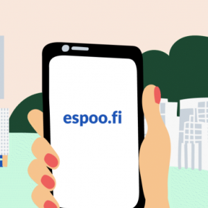 Hand holding a mobile phone with espoo.fi on the screen